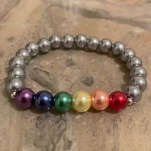 Rainbow glass PRIDE gray bracelet: 6 1/2”-6 3/4”wrist. Double glued/hidden knot.
